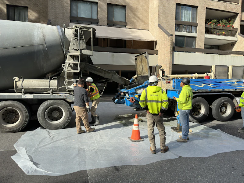Ready-mix truck and crew on a job site